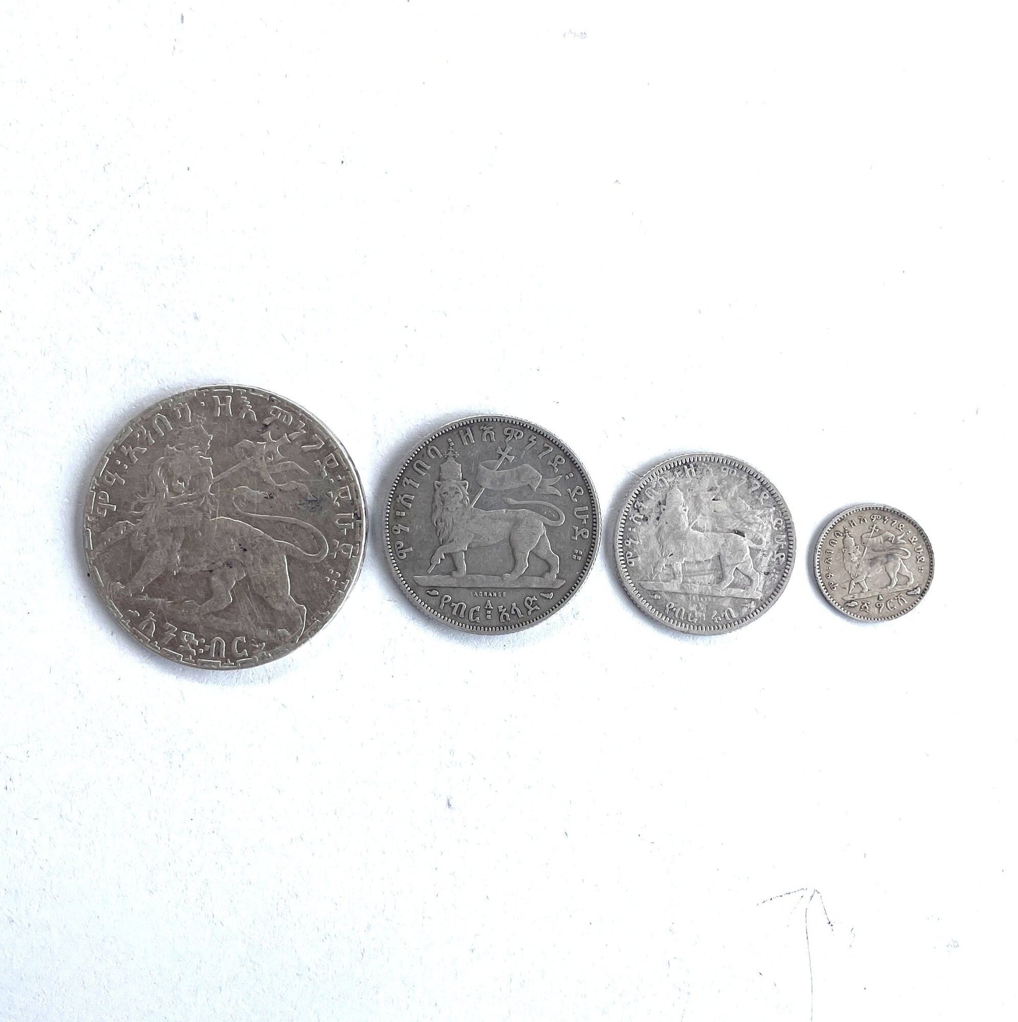 Ethiopian Coin. Collection of Emperor Menelik Lion of Judah Silver coin. Old coin, Ethiopian Coin, Ethiopian Birr, Ethiopian Currency.